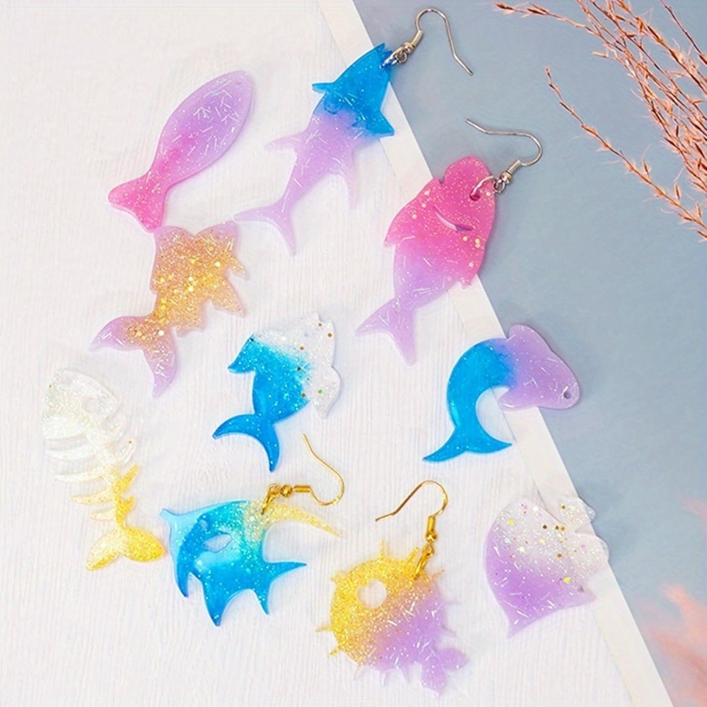 海をテーマにしたイヤリングとペンダントの型セットには、魚の尾 - Marine Aquarium & Regional Centre Photos のレビューと価格